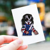 An enamel pin featuring Chucky the doll with a menacing expression and striped hair.