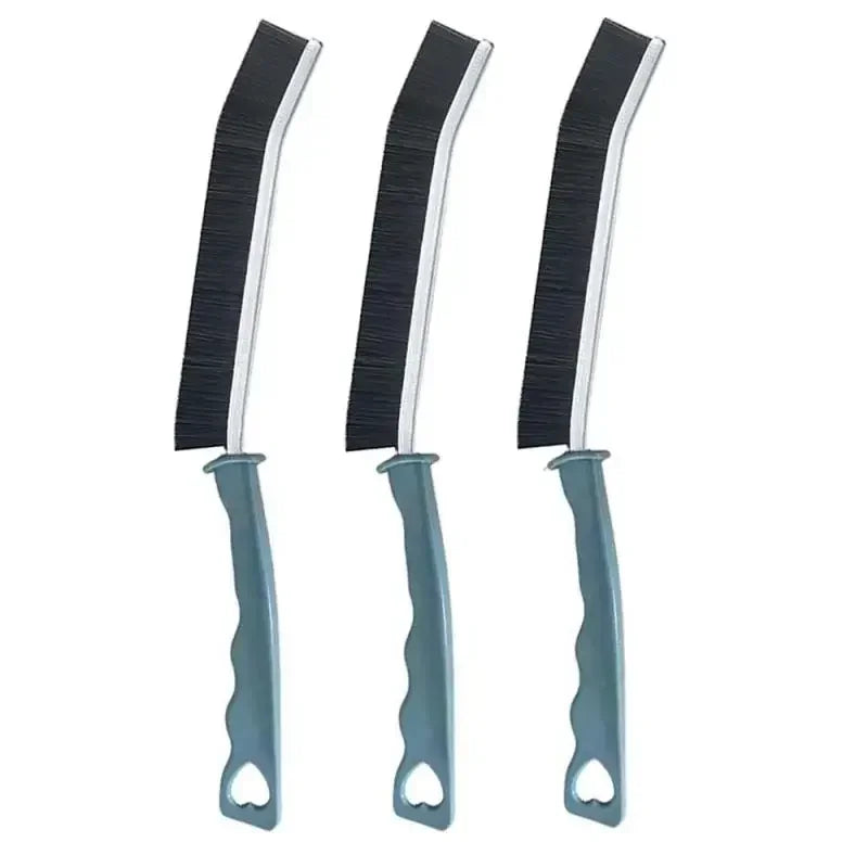 A set of three black and silver multifunctional crevice cleaning brushes.