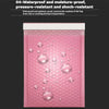 A pink self-seal padded bubble mailer with a textured surface and clear bubbles.