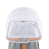 A clear mosquito net cover for a baby's bassinet or crib, shown resting on a wooden frame.