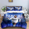 A dark blue duvet cover featuring a soccer player in a white jersey with the text RONALDO