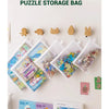 A display of eight transparent mesh zipper pouches for puzzle storage bags in various sizes and colors.