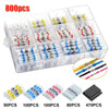 A plastic storage box containing various waterproof heat shrink solder wire connectors with tin-coated copper terminals.