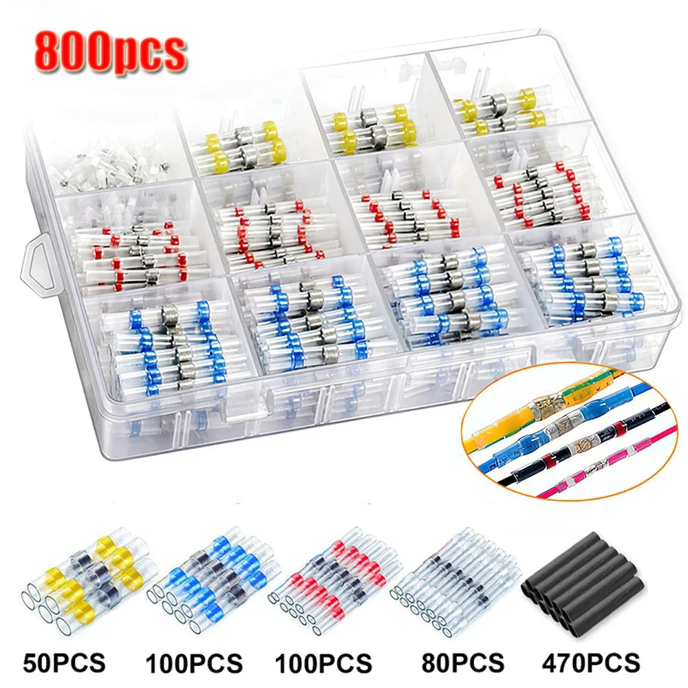 A plastic storage box containing various waterproof heat shrink solder wire connectors with tin-coated copper terminals.