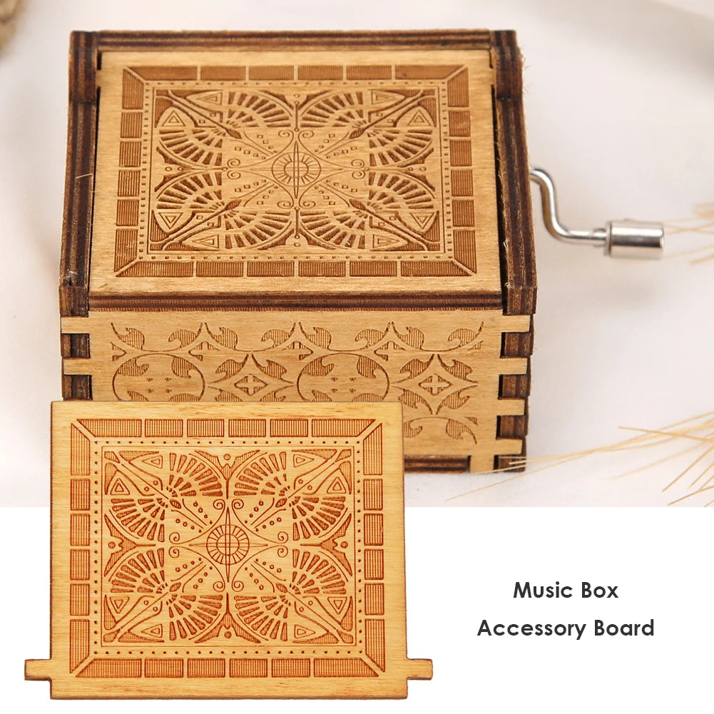 A hand-cranked wooden music box accessory board made of light wood with intricate geometric patterns.