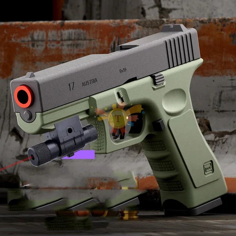 A light green toy pistol with a black slide and orange sight is shown against a textured background.