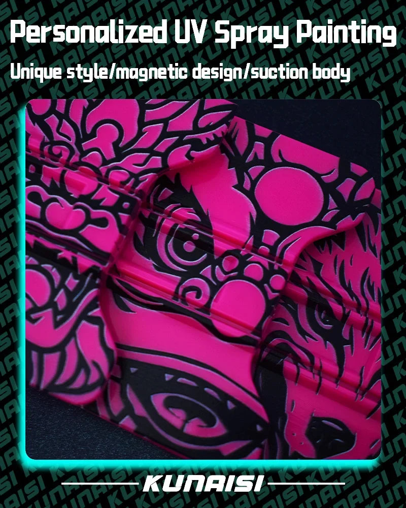 Close-up of a pink UV spray painting design on a black surface.