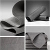 Rolls of gray reusable microfiber cleaning cloths shown in various angles and stacked.
