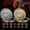 A dragon head silhouette looms over two silver and gold metal dice cases, with several polyhedral dice scattered below.
