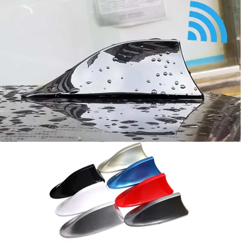 A collection of various colored shark fin car antennas for FM/AM signal enhancement.