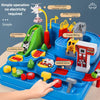A hand interacts with a blue interactive racing rail car set featuring various vehicle and rocket designs.