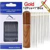 A box of 12 assorted self-threading stainless steel sewing needles with a wooden storage case.