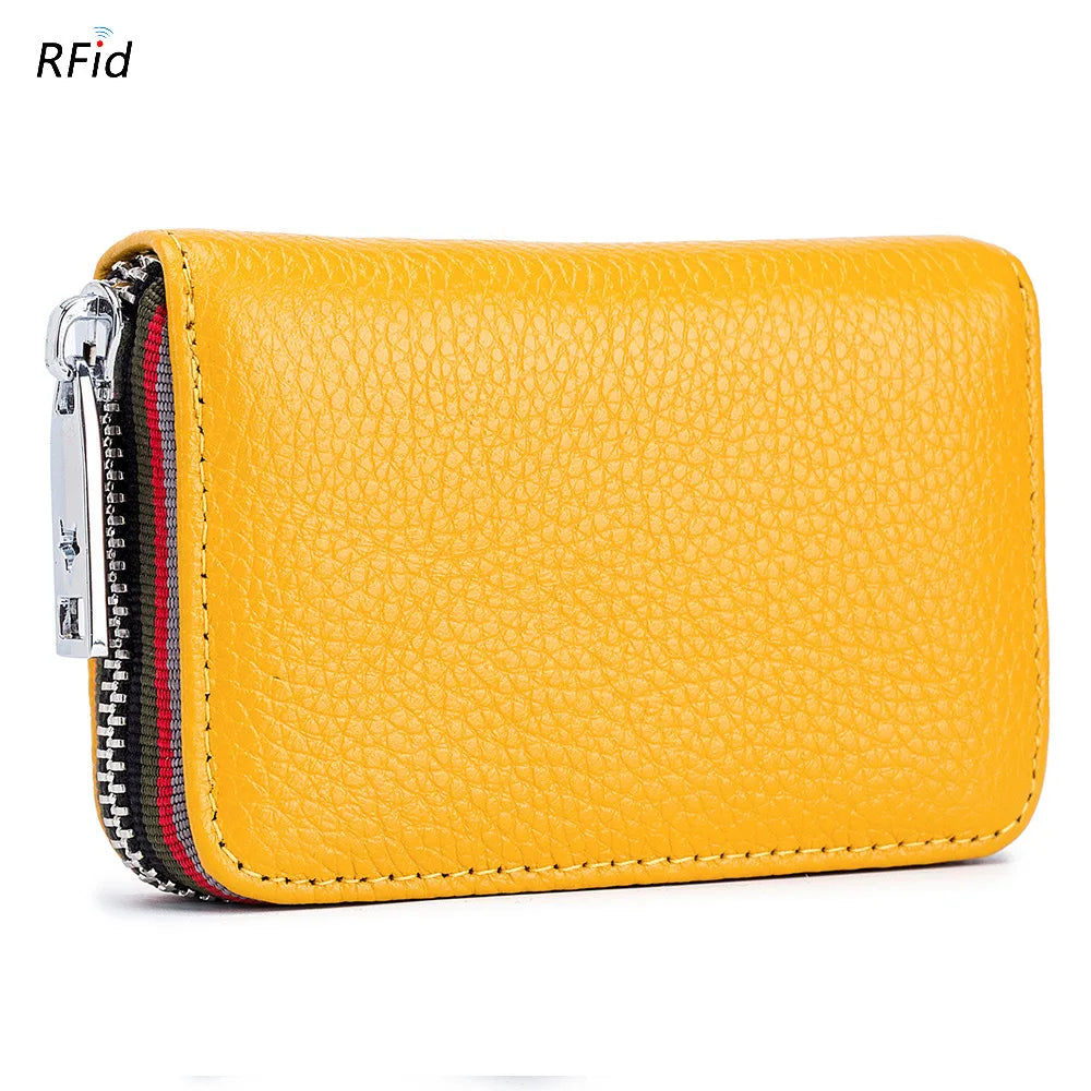 A yellow genuine leather card holder with a zipper and RFID protection feature.