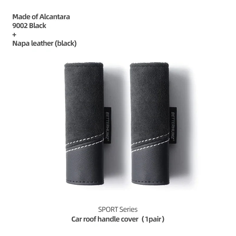 A pair of black Alcantara and Napa leather car roof handle covers for the Sport Series.