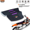 A black and purple ribbed seat cover for a motorcycle is shown next to the bike.