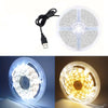 A USB LED strip light with a remote control is shown alongside its disassembled components and illuminated versions.