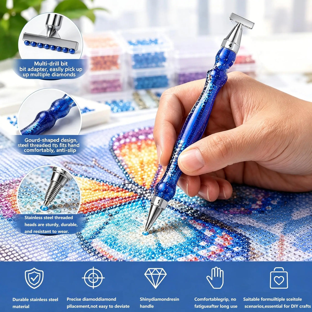 A hand holds a blue stainless steel diamond painting pen tip set with screw-on handles, demonstrating its multi-drill bit fea
