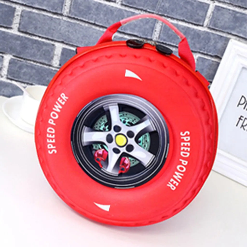 Red backpack shaped like a car tire with a spinning wheel for kids