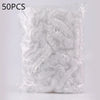 A clear plastic bag containing 50 pieces of disposable transparent waterproof shower caps.