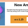A set of three colorful reusable silicone pet can covers for food storage, displayed next to a canned item.