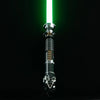 A white lightsaber with a metal hilt is illuminated against a dark background.