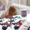 Assortment of colorful elastic cords and beads for jewelry making crafts
