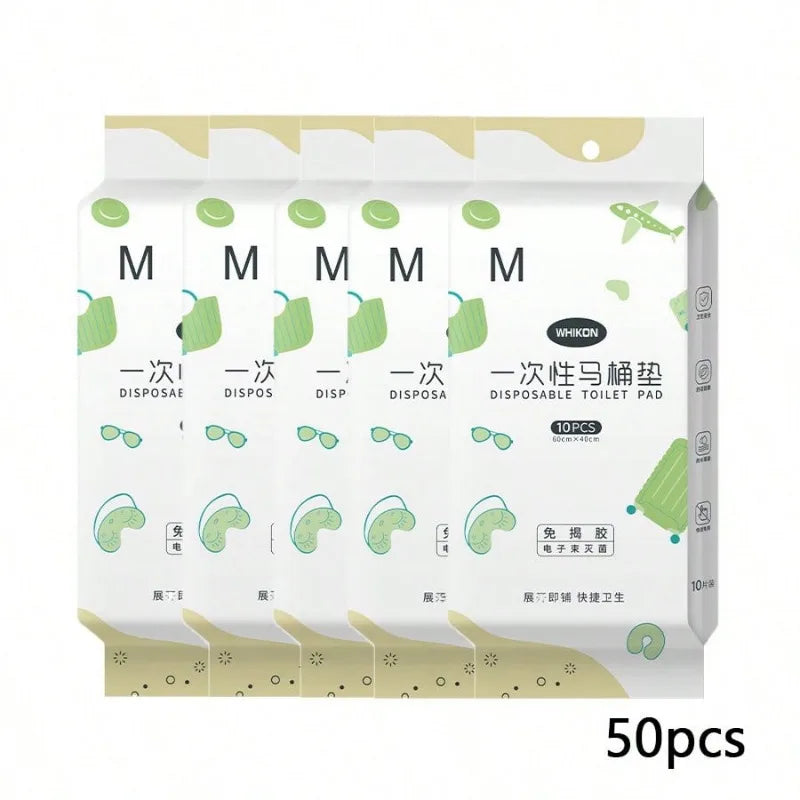 Pack of 50 disposable toilet seat covers in green and white for portable hygiene.