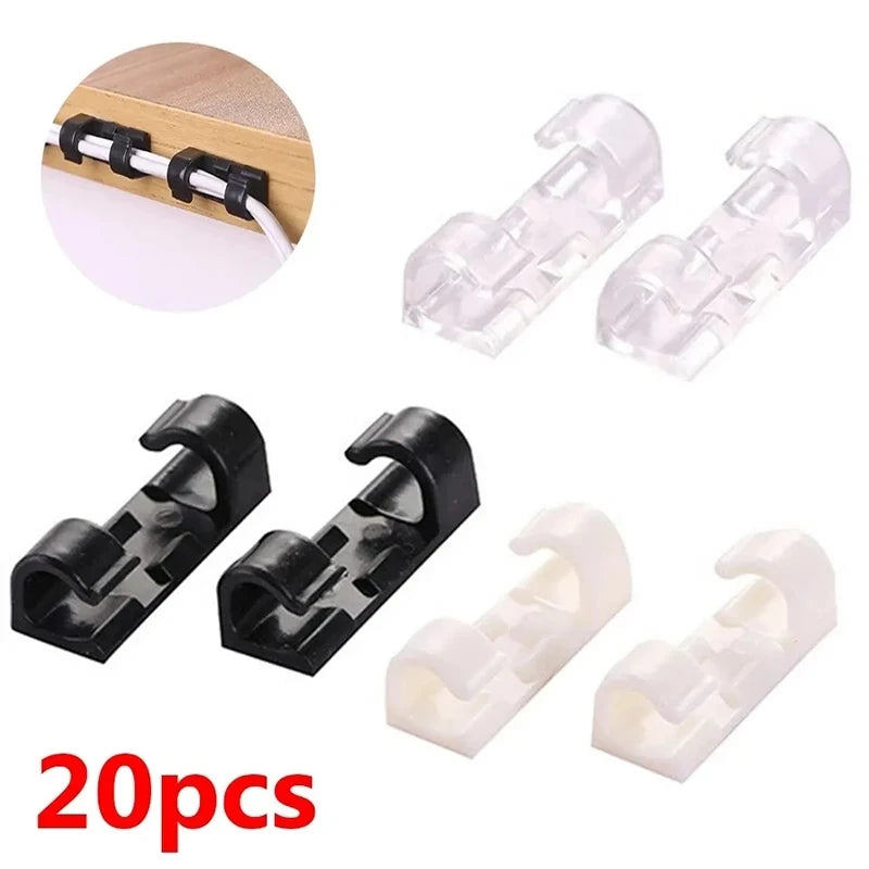 A set of 20 clear and black desktop cable management clips for organizing wires.
