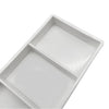 White plastic drawer organizer tray with two compartments for dental instruments