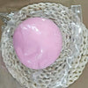 Pinkes sensorisches Stressabbau-Squishy-Fidget-Ball, verpackt in klarem Plastik und umgeben von weißer Schnurtextur.
