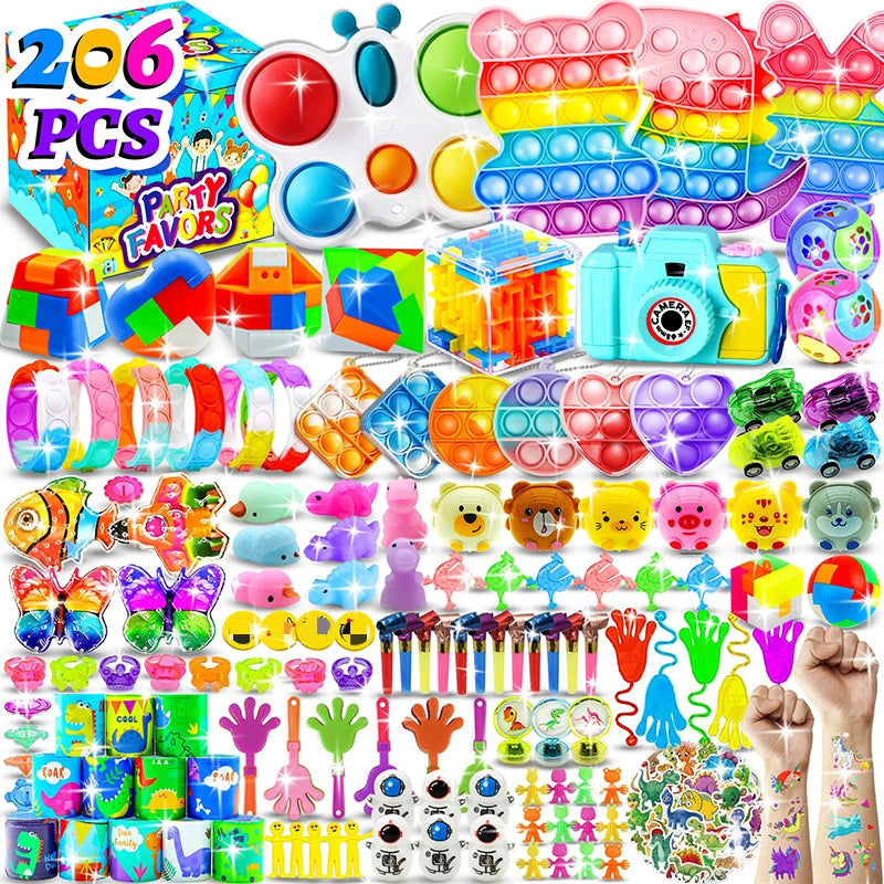 Assortment of colorful kids party favors including snap bracelets, fidget toys, and various small plastic items