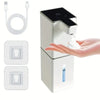 A white touchless automatic soap dispenser is shown with a hand dispensing soap and a bottle visible.
