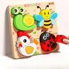 A wooden jigsaw puzzle featuring three animals: a green lizard, a yellow bee, and a white chicken.