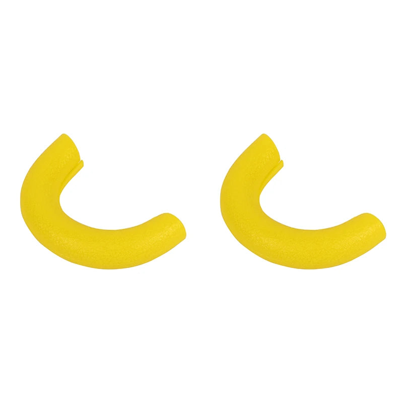 A pair of yellow TPE front bumper tow hook covers for a Ford F-150.
