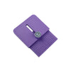 A purple precision vinyl cutting tool featuring a blade and a measurement scale on its surface.