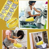 A reusable yellow shoe laundry bag with a bristled brush being washed in a white washing machine.