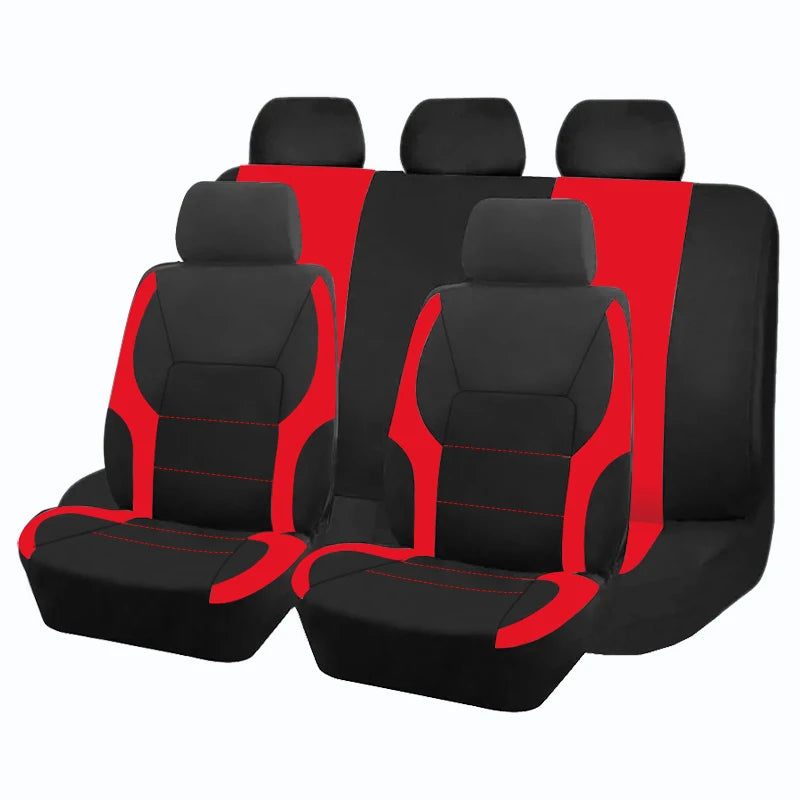 A set of four black and red two-tone car seat covers shown side by side.