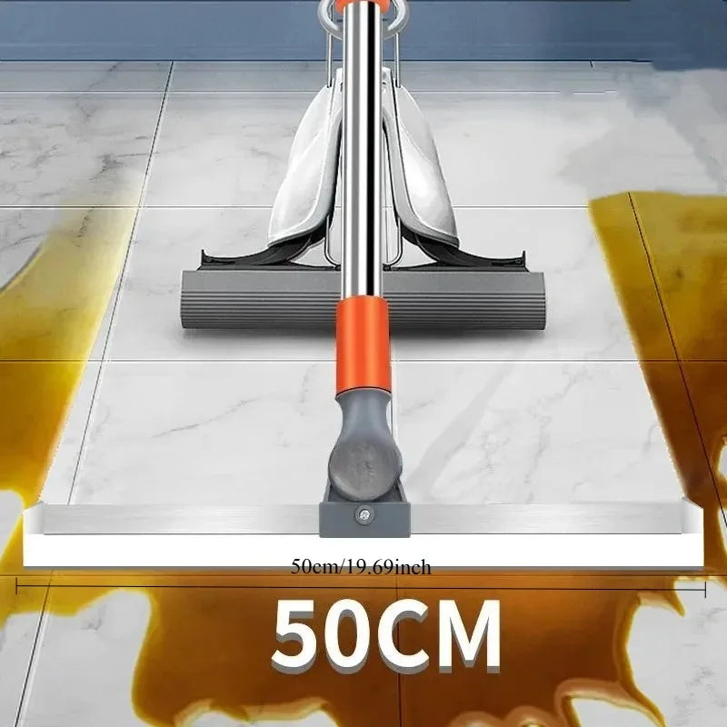 A silicone squeegee broom with an aluminum handle is shown across a marble surface.