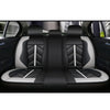 Black and gray universal waterproof PU leather car seat covers installed in a vehicle interior.