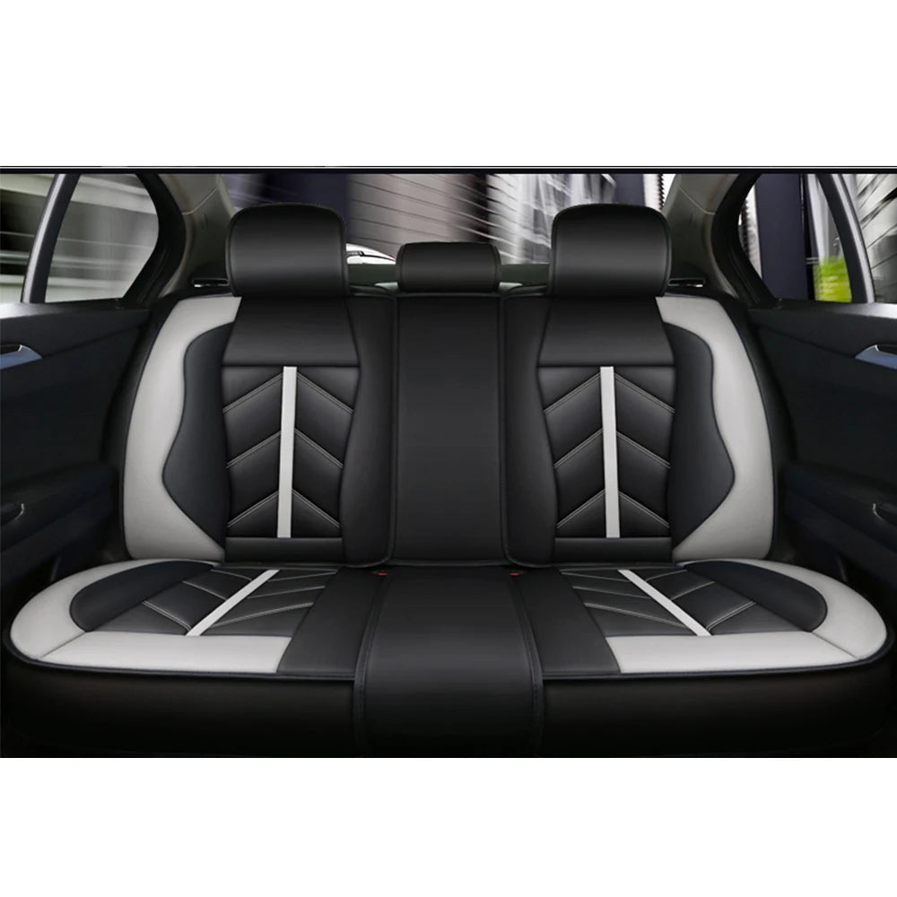 Black and gray universal waterproof PU leather car seat covers installed in a vehicle interior.