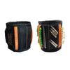 Black magnetic wrist strap with orange accents holding various screws, nails, and small tools.