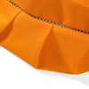 Orange fabric of a kids' craft apron and chef hat set with a black striped detail.