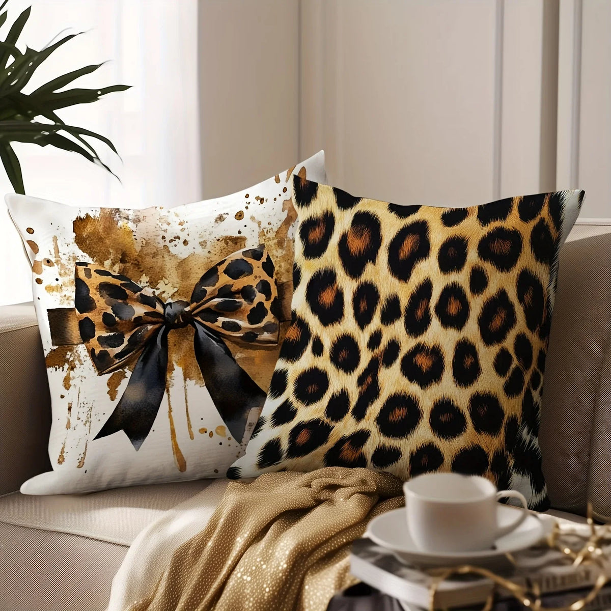 A decorative pillow featuring a leopard print design with an orange and black bow on a light background.