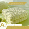 A stack of yellow bubble yarn summer cool quilt fabric next to a label describing its use for maternal and child level gnawin