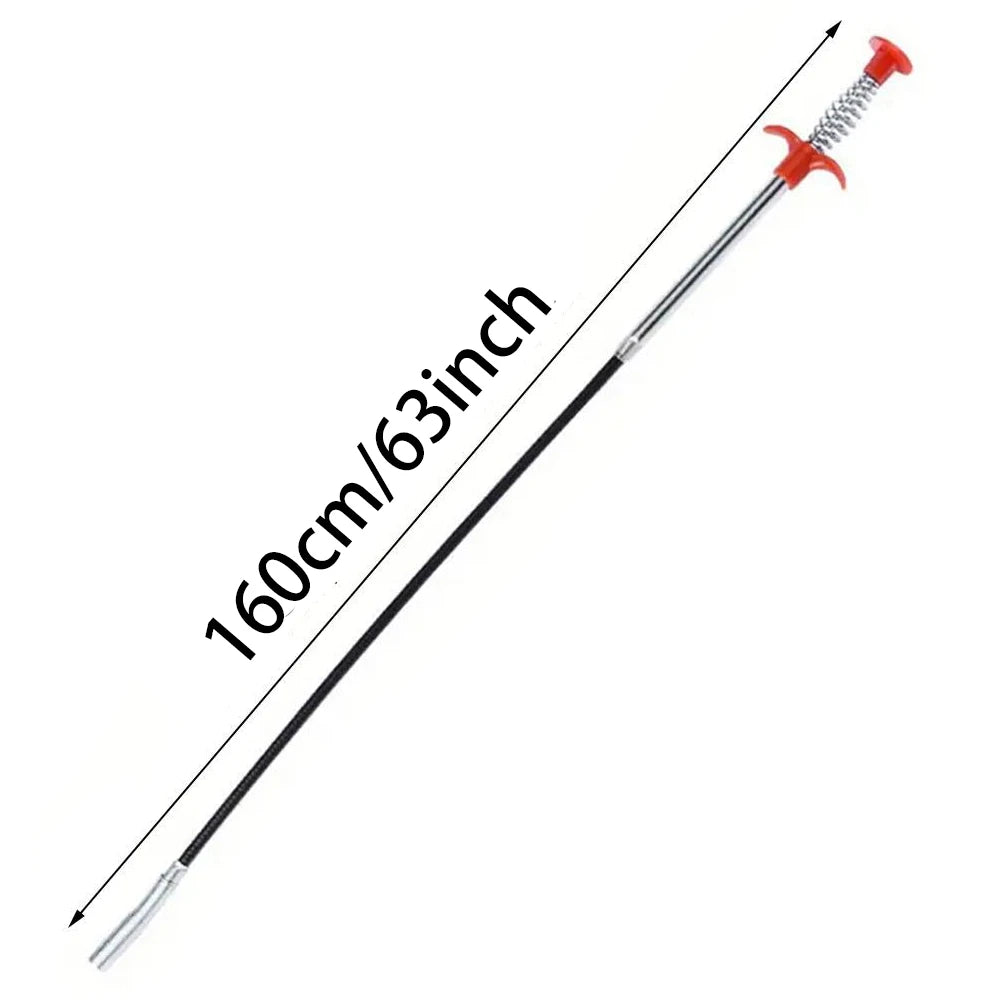 A long, thin flexible drain snake with a red handle and silver tip, shown diagonally.