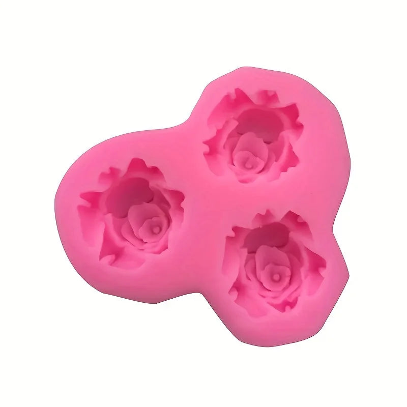 A pink silicone rose mold with four flower shapes for crafting resin, clay, soap, and candles.