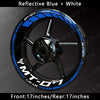 Reflective blue and white decals on a black motorcycle wheel rim for Yamaha MT-07