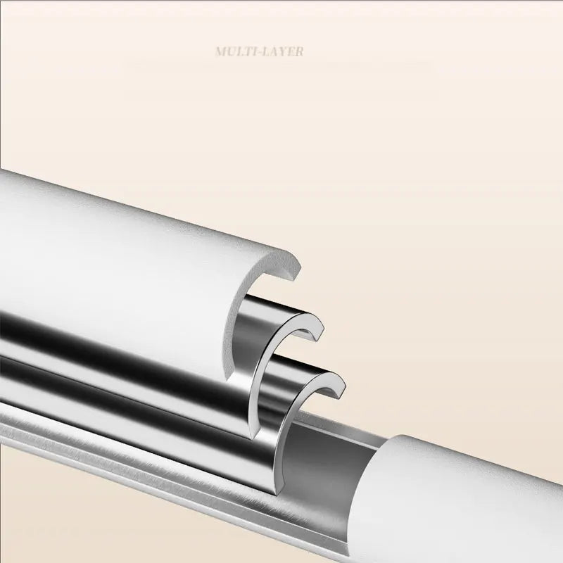 Close-up view of an adjustable stainless steel tension shower curtain rod with a white finish.