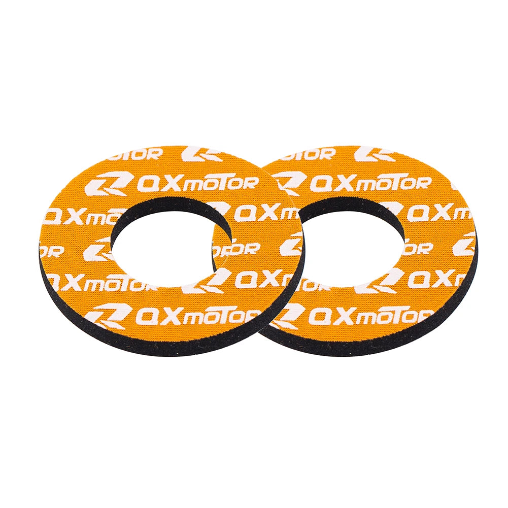 A pair of orange and black universal dirt bike handlebar grips.