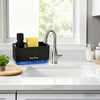 A black kitchen dish soap dispenser with a pump and yellow sponge holder sits on a white countertop next to a sink.